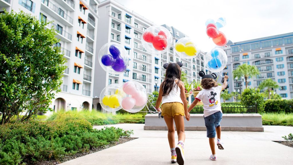 Kids with balloons at Disney Resort