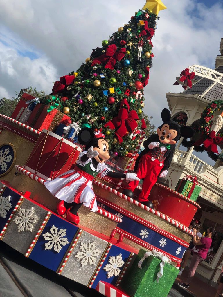 Mickey and Minnie Mouse in front of Christmas Tree at Walt Disney World